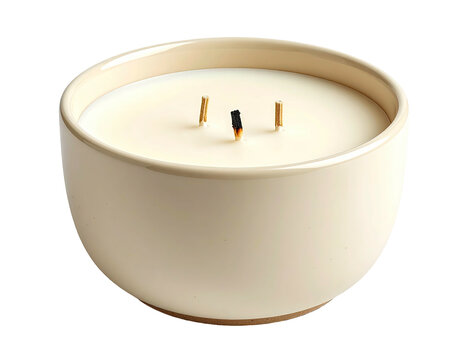 Three-wick candle in beige ceramic bowl