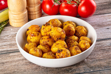 Baked small baby potato with herbs