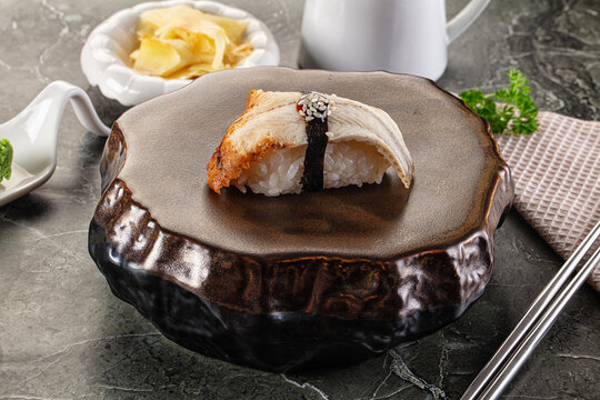 Japanese cuisine - sushi with eel - Powered by Adobe