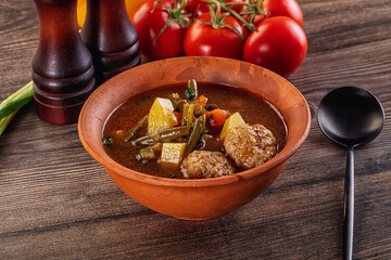 Tomato Soup with meatballs and vegetables