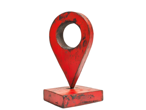 Striking red location pin sculpture with textured base on a transparent background