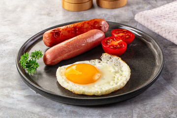 Breakfast with egg and sausages