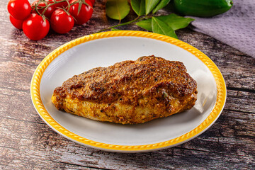 Baked chicken breast with spices and herbs
