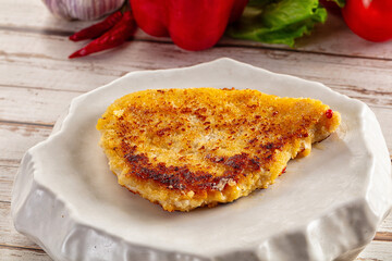 Breaded crispy chicken schnitzel