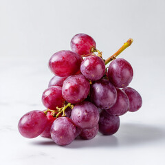 AI-generated image - A fresh bunch of ripe, red grapes with several loose berries, isolated on a clean white background.