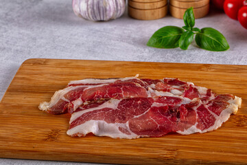 Cured pork Spanish jamon slices
