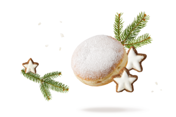 Fresh baked donut icing sugar powder and glazed gingerbread star cookies flying falling isolated on white background. Sweet doughnut closeup. Berliner donut. Christmas pastry card.