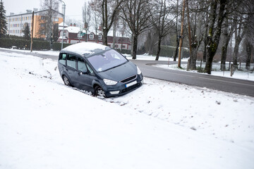 Car Sliding Off Icy Winter Road Into Snowy Roadside Ditch