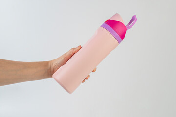 Hand holding cup cold storage. Tumbler glass cold store. on white background.