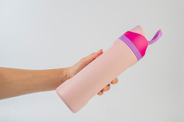 Hand holding cup cold storage. Tumbler glass cold store. on white background.