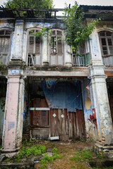 Facade of the old chinese abandoned house in Papan Heritage village in Perak Malaysia