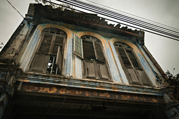 Facade of the old chinese abandoned house in Papan Heritage village in Perak Malaysia
