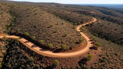 Aerial Winding Dirt Road in Dry Hills