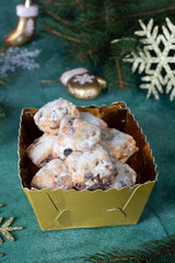 Christmas German Stolen confectionery with raisins in powdered sugar. Traditional treats in Germany