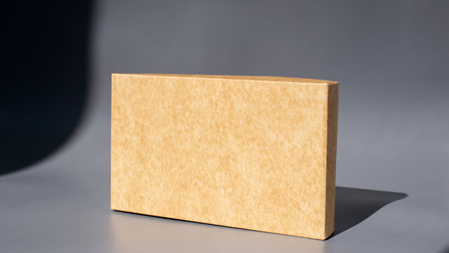 Simple brown rectangular box on gray background
