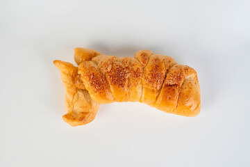 Baked bread stuffed with chicken sausage on white background