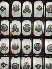 ​Traditional Japanese style paper lanterns wall glowing in the dark night