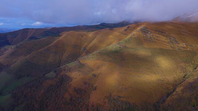 Aerial view from a drone of the winter landscape around the village of Vega de Pas in the Pasiegos Valleys. Cantabria. Spain. Europe