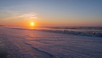 Obraz premium Sunrise during the Polar Vortex at a beach, highlighting seasonal change