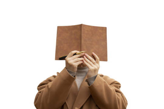 Woman covering her face with a notebook isolated
