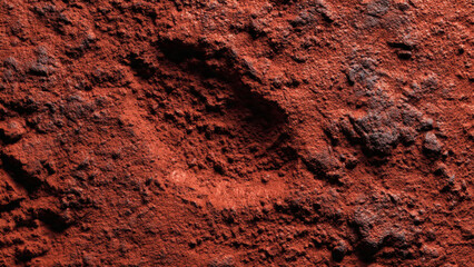 Close-up of rugged reddish-brown rock formations on an ancient Martian-like alien terrain, showcasing intricate textures and geological erosion patterns