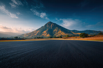 Asphalt Race Track and Mountain Landscape under Daylight a Vantage Point of the Mountain Nature's Scenic Beauty