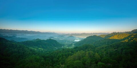 Fototapeta premium Purple lilac blooms on a branch with shallow depth of field for floral photography, spring awareness day