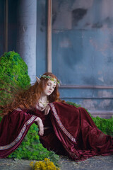 A red-haired girl in an elf costume