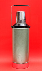 Old style Isolated bottle on red background.