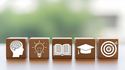 Wooden blocks with icons representing education and success learning knowledge