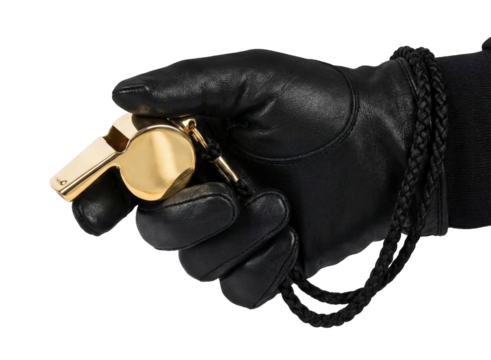 Hand in black leather glove holding golden metal whistle isolated on white