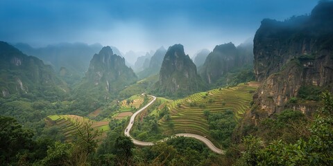 Aerial view of a road cutting through a citrus grove and farmland in Southern California, emphasizing agricultural landscape and seasonal growth
