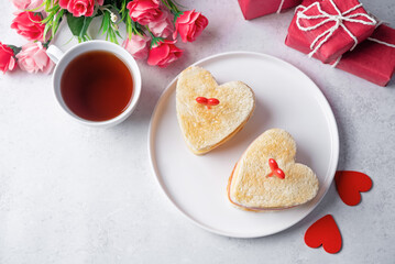 Ham tomato and cheese canape sandwiches in the form of heart for Valentine's day holidays