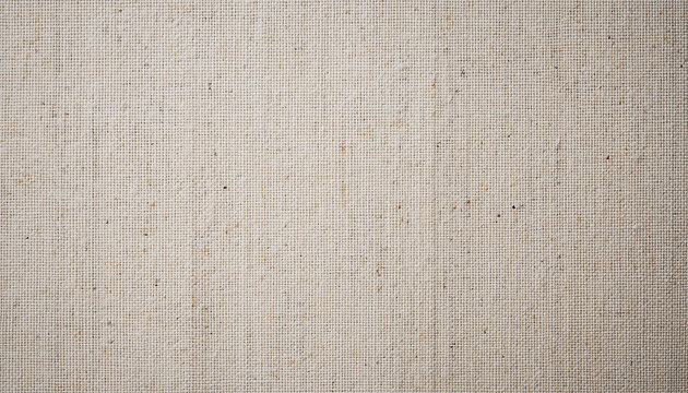 Close-up textured background of natural beige woven fabric with visible threads textile