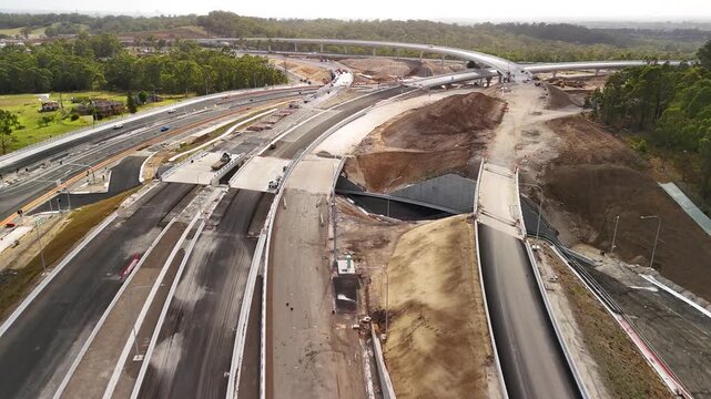 Aerial drone view above the M7-M12 Interchange at Cecil Hills, Western Sydney, NSW Australia on a sunny morning in December 2025