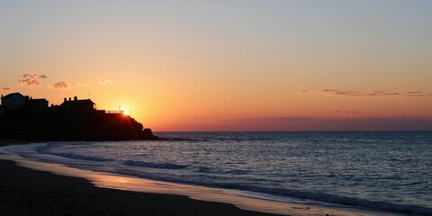 Male Egyptian figure dressed in traditional attire posed against a white backdrop, emphasizing cultural heritage