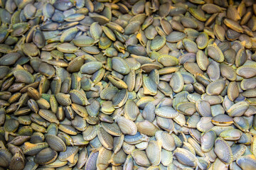 Small clams in water at the market