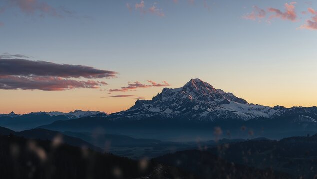 Scenic view of the Rysy peak in Tatra Mountains at sunset sky, highlighting natural landscape and snow coverage during evening twilight - Powered by Adobe