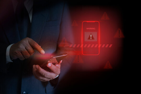Digital Scam Warning on Mobile Phone Screen. Cyber threat warning with red alert, hacking, malware, data breach, and digital security threats on mobile and smart technology platforms.