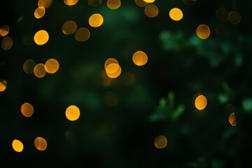 Enchanting Dreamy Backdrop Featuring Defocused Yellow Lights Against a Rich Green Background