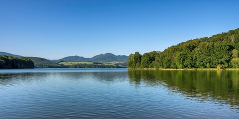Luxury bathroom featuring a fireplace and bay view, designed for relaxation and scenic enjoyment, Earth Day