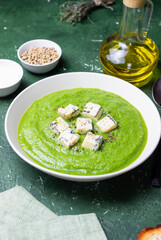 Green broccoli soup with blue cheese. Vegetarian. Healthy eating.