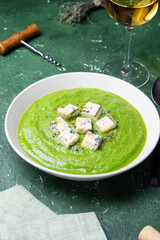Green broccoli soup with blue cheese. Vegetarian. Healthy eating.