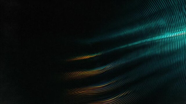 Abstract design featuring vibrant waves and light patterns against a dark background.