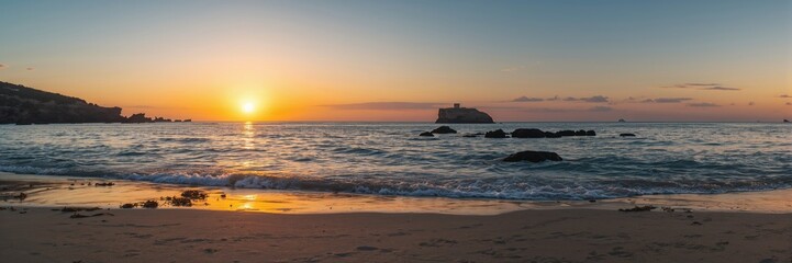 Sun rising over a beach scene providing natural light for early morning recreation, Earth Day