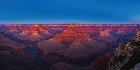 Table with pictures and decor near brick wall, ideal for interior design backgrounds