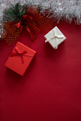 Christmas gift boxes on red festive background
