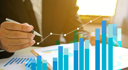 Businessman reviewing balance sheet and virtual data charts. financial analysis concept, strategy planning and growth opportunities, calculating company investment