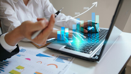 Business people using laptop to analyze performance with business analytics dashboard. strategy planning and growth opportunities, calculating company investment