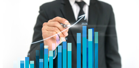 Businessman reviewing balance sheet and virtual data charts. financial analysis concept, strategy planning and growth opportunities, calculating company investment